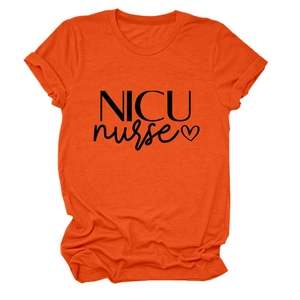 Detail of the bright orange NICU nurse t-shirt with heart graphic and cotton fabric