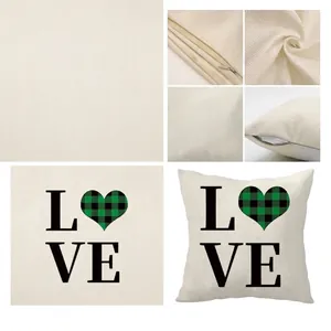 Linen Saint Patrick's Day pillow cover with LOVE print and green plaid heart motif