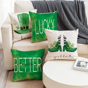 Set of four Saint Patrick's Day linen pillow covers with shamrock and lucky motifs
