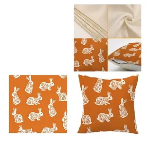 Easter linen pillow cover with orange paper-cut rabbit print and hidden zipper