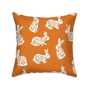 Easter bunny linen pillowcase with orange base and white floral rabbit pattern