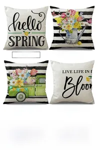 Spring themed linen pillow covers with floral motifs and artistic lettering patterns