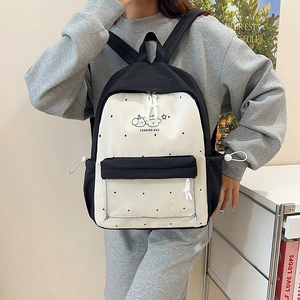 Cute polka dot school backpack with clear front pocket and cartoon dog print for girls