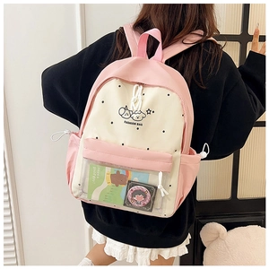 Detail of pink and white school backpack with transparent PVC pocket and cute dog print