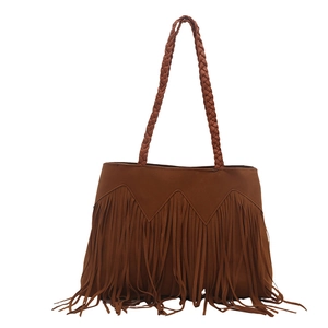 Brown Bohemian tassel tote bag with woven handles and fringe detail in ethnic style