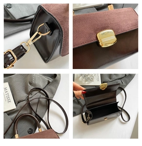Detail of retro suede and leather bag showing gold buckle and fine texture close-up