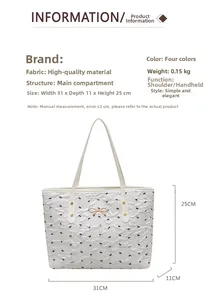 Tableau des tailles détaillé montrant le sac fourre-tout blanc à nœuds de 31x11x25cm