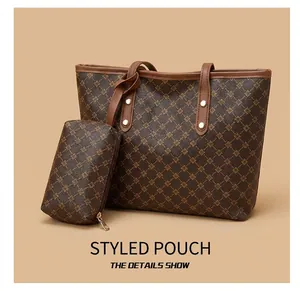 Macro detail of large tote bag and matching mini pouch with geometric pattern and golden studs