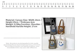 Detailed size specifications of the canvas smiley tote bag showing height and width dimensions