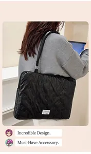 Detail of black quilted laptop bag featuring 3D rabbit head pattern and fashion label