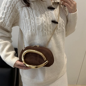 Brown suede round clutch bag with golden artistic metal handle and chain shoulder strap