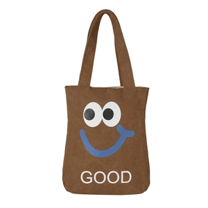 Brown canvas tote bag with cartoon smiley face and GOOD text for women daily use