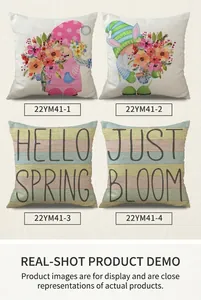 Detail of four spring floral linen pillow covers with gnomes and hello spring lettering