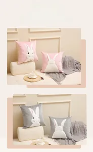 Detail of pink velvet pillowcase featuring soft 3D white rabbit embroidery with a textured finish