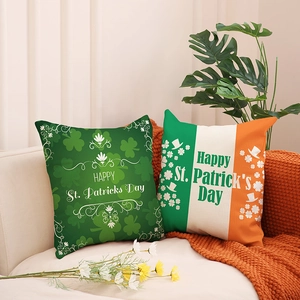 St. Patrick's Day clover print linen throw pillows on a beige sofa for home decor