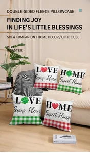Detail of soft plush pillow covers with LOVE and HOME prints on a modern sofa set