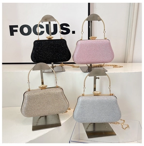 Collection of sequined evening clutch bags in four colors with petal metal handles