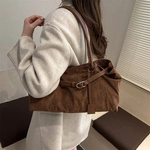 Brown corduroy large capacity tote bag with leather straps and silver buckle detail