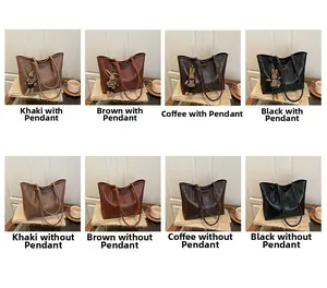 Detailed grid showing large tote bags in four colors with or without rabbit pendant