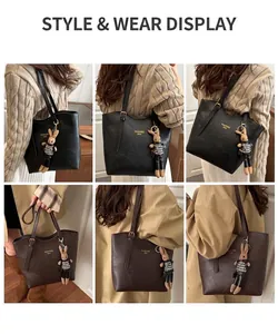 Chic tote bag with textured faux leather and a cute bunny charm shown on models
