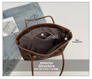 Detailed interior of leopard print tote bag showing spacious main compartment and zipper pocket