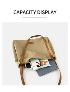 Large khaki canvas tote showing spacious interior capacity with daily essentials
