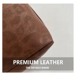 Detailed macro view of high-quality brown leopard print leather texture and stitching