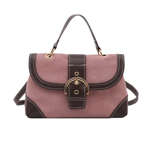 Retro contrast color handbag in pink suede and brown leather with large gold buckle