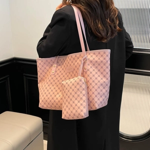 Pink large capacity faux leather tote bag with geometric pattern and matching pouch