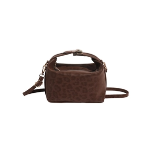 Deep brown leopard print doctor bag with gold buckle and adjustable shoulder strap