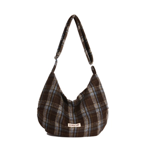 Vintage plaid hobo bag in brown and blue wool fabric with adjustable crossbody strap