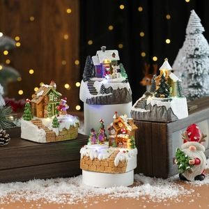 Miniature de maison de Noël enneigée avec LED, musique et lumières de fête chaleureuses