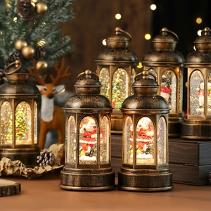 Vintage Christmas musical snow globe lantern with Santa and tree, glowing warm LED light