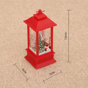 Red Christmas lantern detail with Santa pattern showing 13cm height and 5cm base size