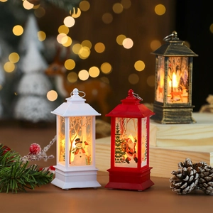 Set of three vintage Christmas LED lanterns in red, white, and bronze for holiday decor