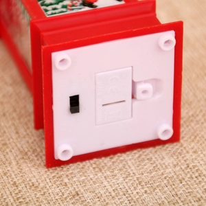 Detail of Christmas lantern base with power switch, battery compartment and CE certification