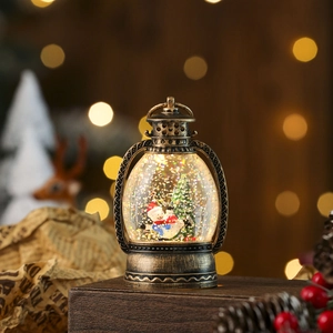 Detail of vintage bronze Christmas lantern featuring snow globe swirling glitter inside