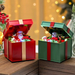 Glow-in-the-dark Christmas gift box decorations with LED lights and festive music