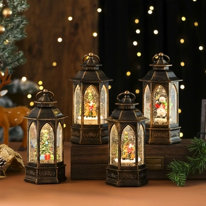 Set of four vintage Christmas lanterns with glowing snow scene and classic holiday figures