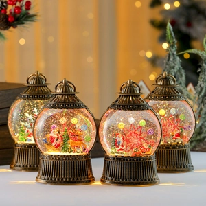 Set of four bronze Christmas snow globe lanterns with Santa and reindeer LED lights