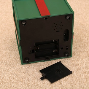 Detail view of the Christmas gift box base showing battery compartment and DC power port