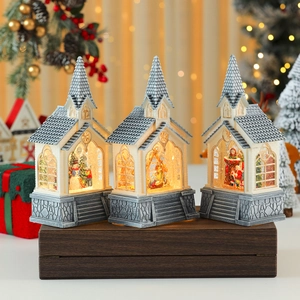 Three-piece set of lighted Christmas church ornaments with snowmen and warm LED glow