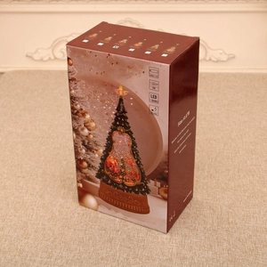 Detailed gift box view of musical LED Christmas tree with USB and battery power options