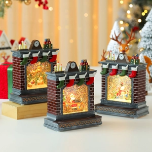 Illuminated Christmas fireplace music box with Santa figurines and festive LED lights