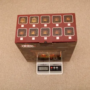 Detailed view of LED Christmas lanterns packaging on scale weighing 1352 grams