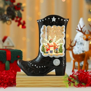 Détail de la boîte à musique en forme de botte de Noël avec bonhomme de neige et socle