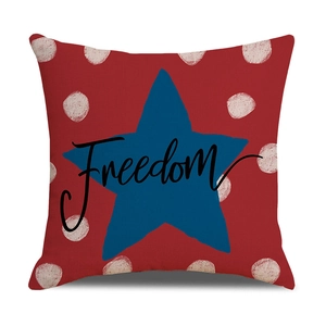 Detail of red linen pillowcase featuring a navy star and Freedom text with fiber texture