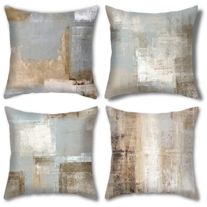 Detailed set of four abstract art print cushion covers with modern geometric block patterns