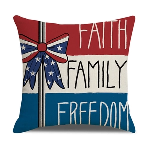 Macro detail of linen pillowcase with stars, bow, and Patriotic Faith Family Freedom text