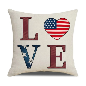 Detail of linen pillowcase with American flag heart and LOVE text print on beige fabric